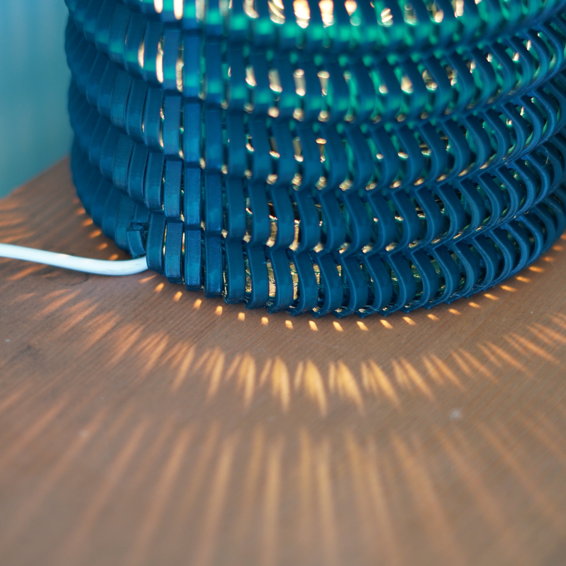 close-up of a lamp that that casts shadows 