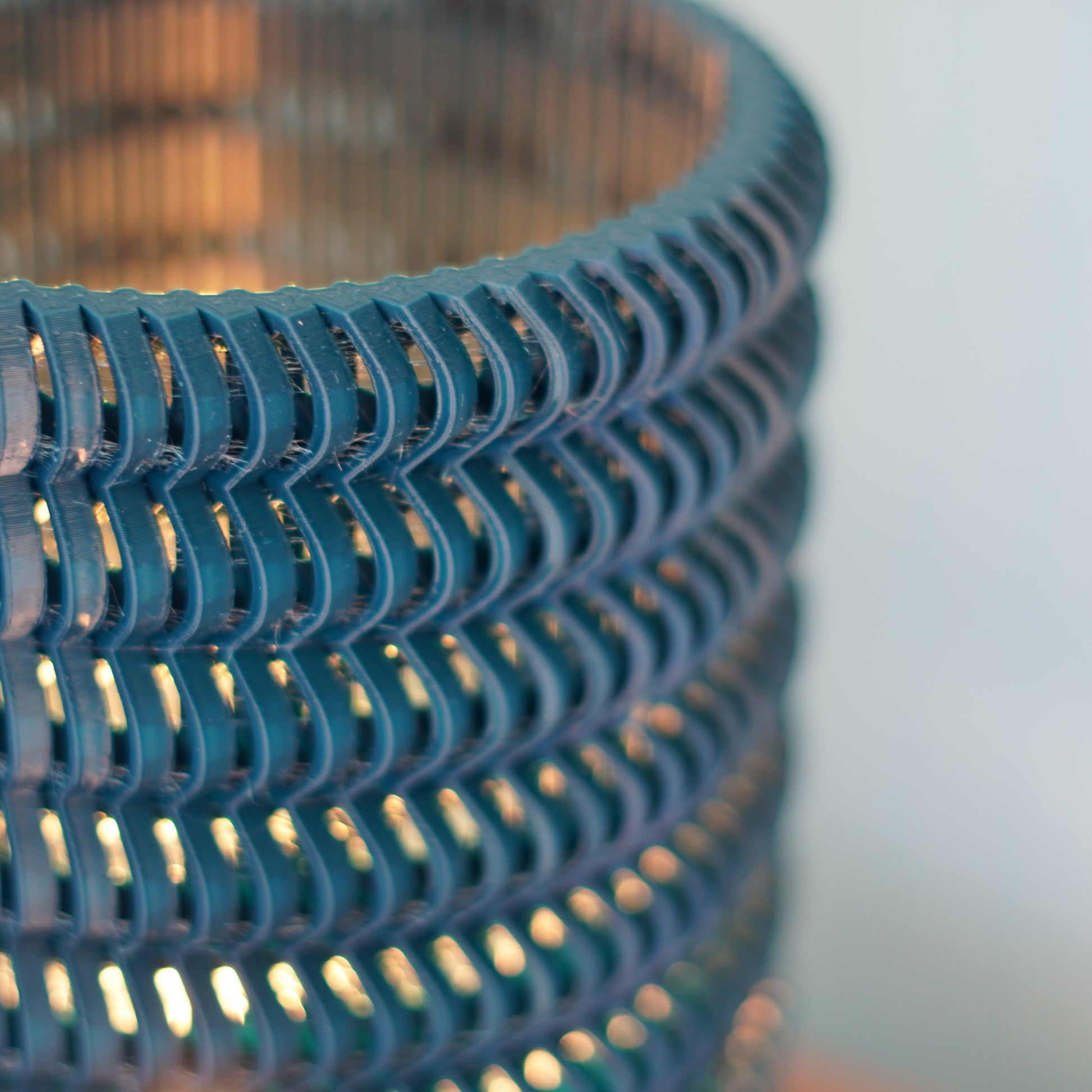 close-up of  a lamp that that casts shadows 