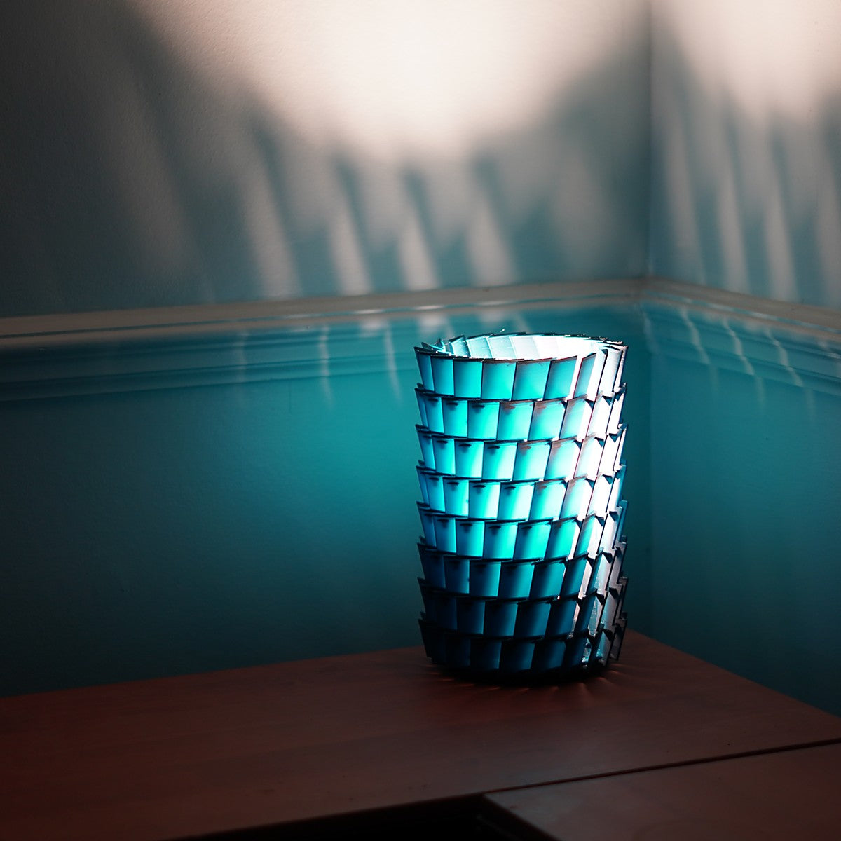 a lamp that casts shadows 