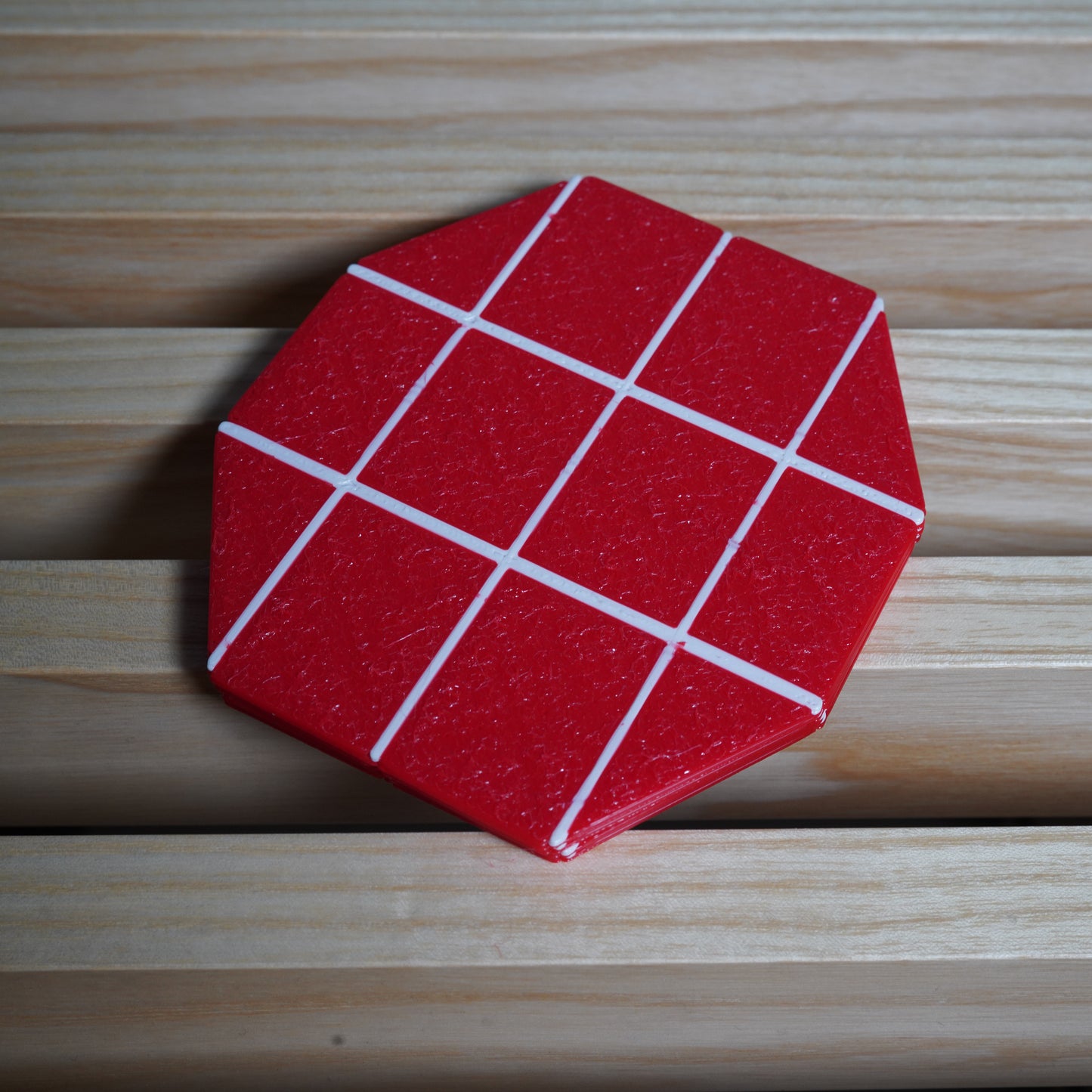 a coaster from the set of four inspired by the top of the Margate Lido sign
