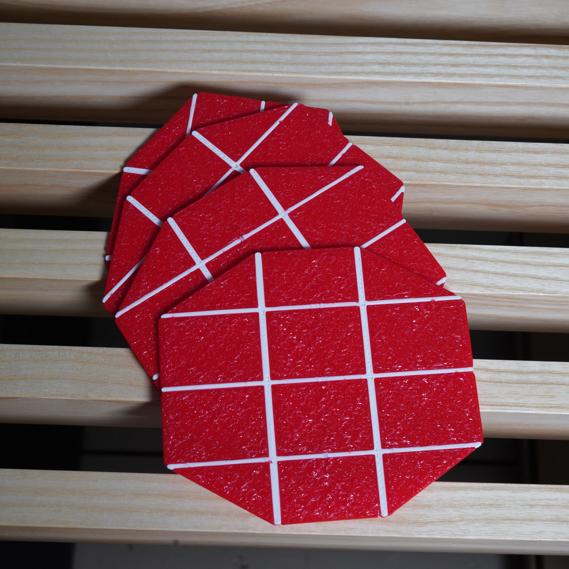 a coaster set inspired by the top of the Margate Lido sign