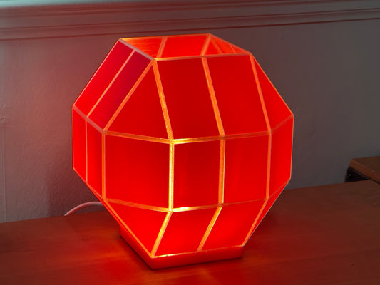 a table lamp inspired by the top of the Margate Lido sign and uses UK mains power